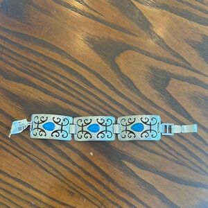 Silver and Blue Bracelet with Intricate Design
